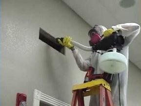 Hazmat Cleanup technician deodorizing a house with a disinfectant fogger.