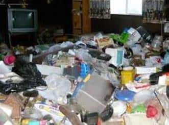 picture of a hoarding mess in a home.