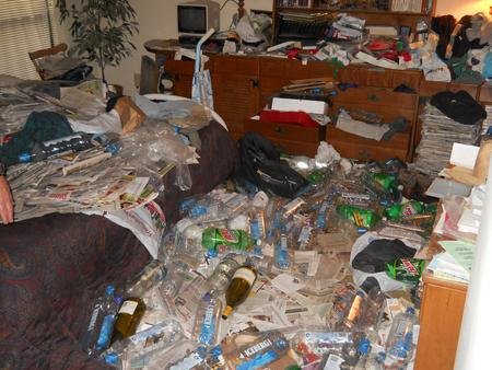 Hoarding home in Pinellas County, FL A room filled with junk and garbage.